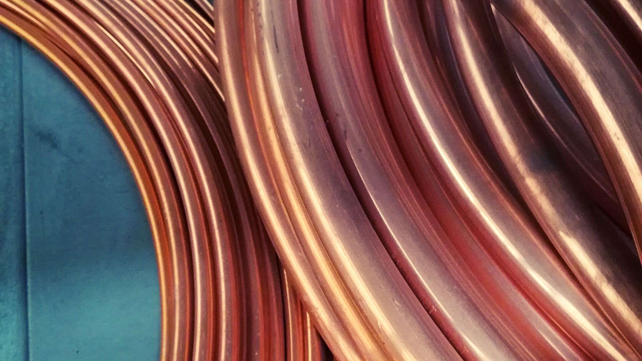 Bending copper pipe using pipe bender for plumbing HVAC and industrial systems